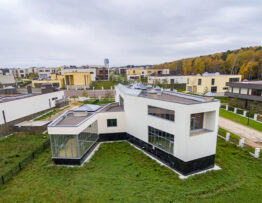 Which society has affordable apartments on NH 24 in Ghaziabad?