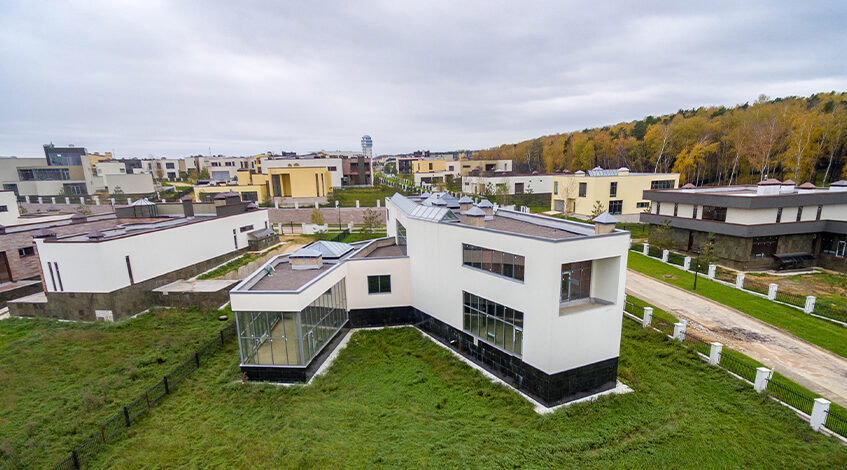 Which society has affordable apartments on NH 24 in Ghaziabad?